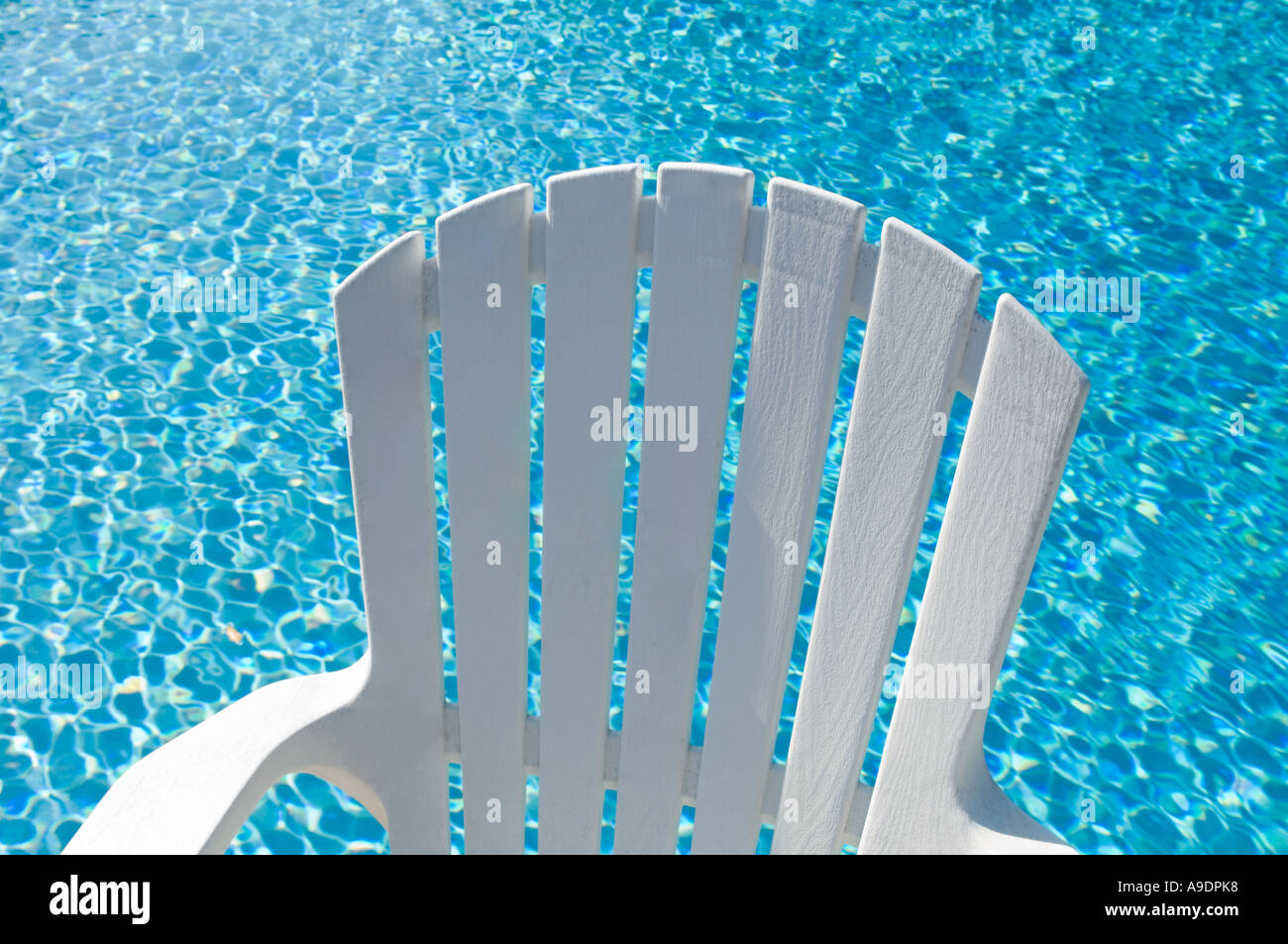 Adirondack chair by swimming pool in Florida USA Stock Photo Alamy