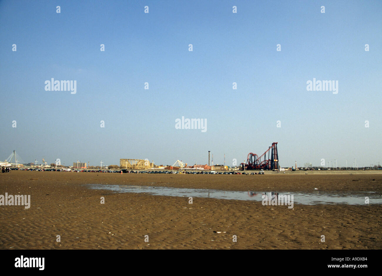 Southport beach with TraumaTizer fairground ride in distance Stock Photo
