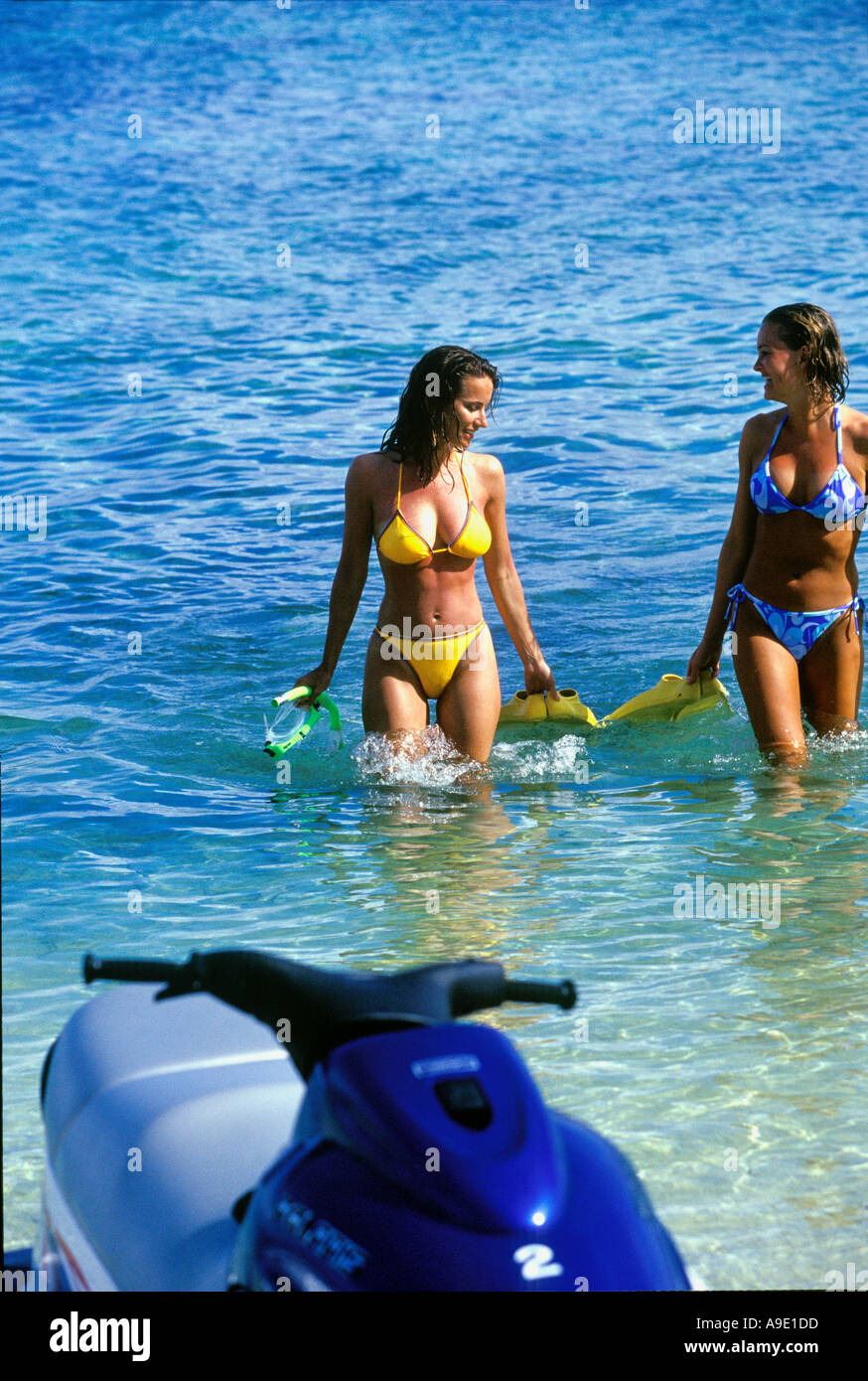 Girls in bikinis at beach with Jet Ski Fiji model releases 299 300