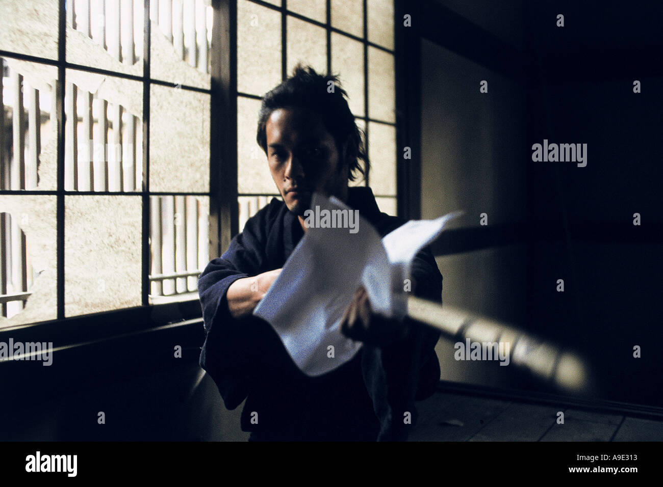 Samurai with raised sword hi-res stock photography and images - Alamy