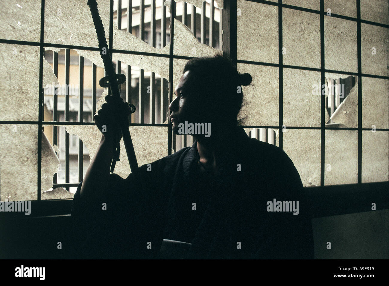 Samurai with raised sword hi-res stock photography and images - Alamy