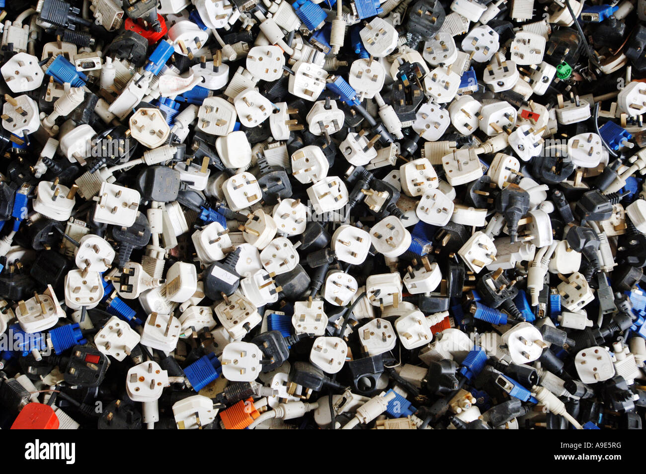 Recovered electrical plugs at a recycling centre Stock Photo Alamy