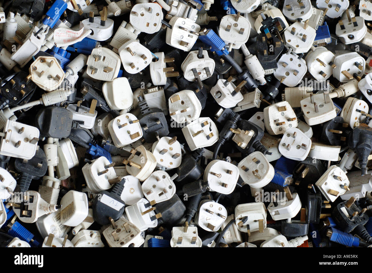 Recovered electrical plugs at a recycling centre Stock Photo Alamy