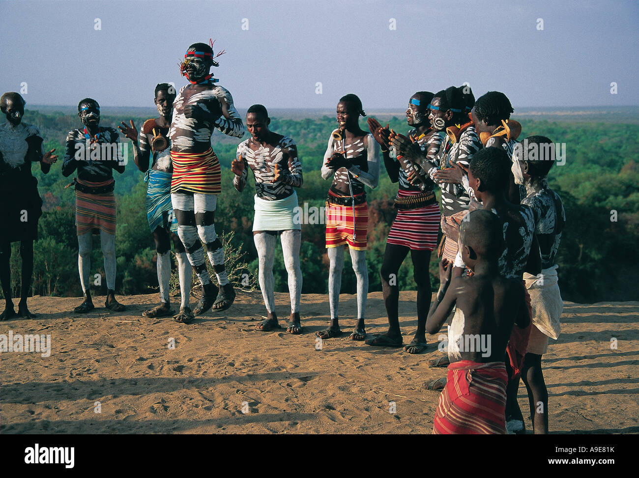Karo dances note hand painted bodies Banks of Omo river Murulle Ethiopia Stock Photo