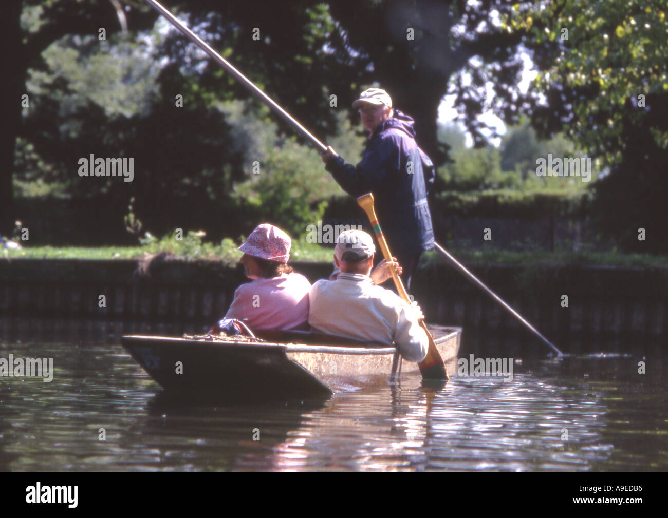 Older people relaxing on river at Oxford UK Stock Photo