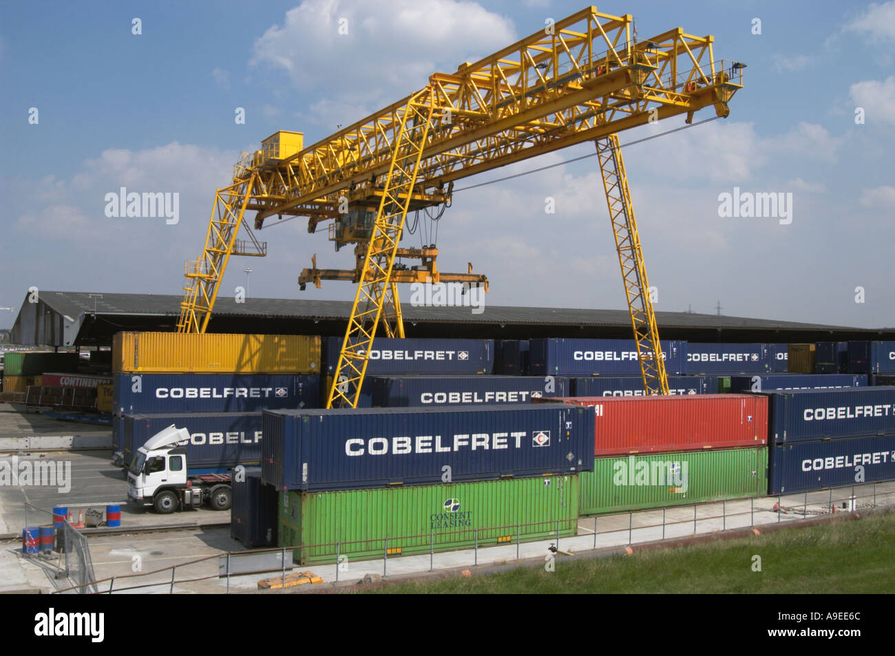 Containers and container crane Cobelfret wharf on Thames near Tilbury ...