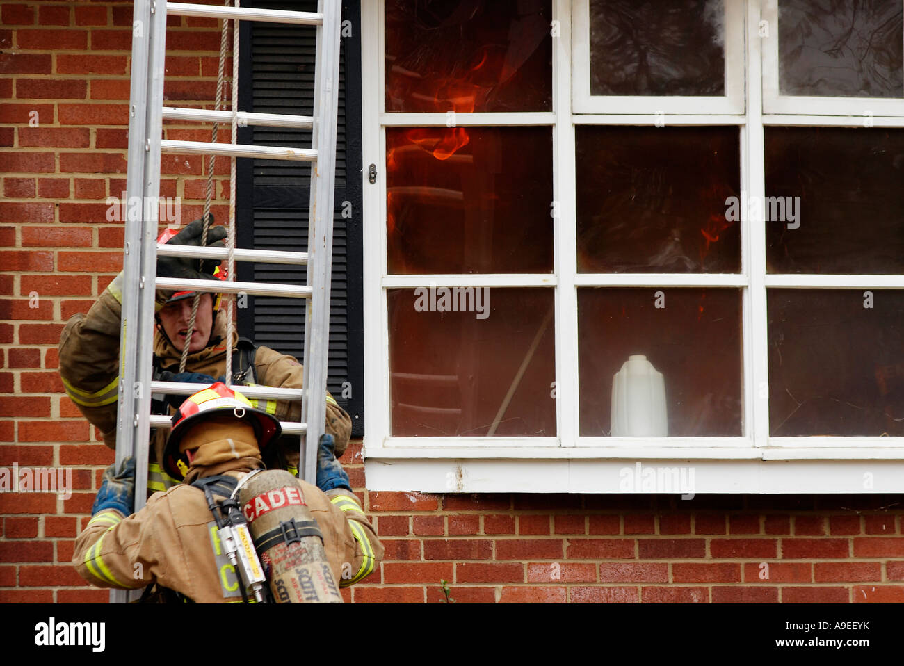Firefighter training exercise controlled burning of a house McLean