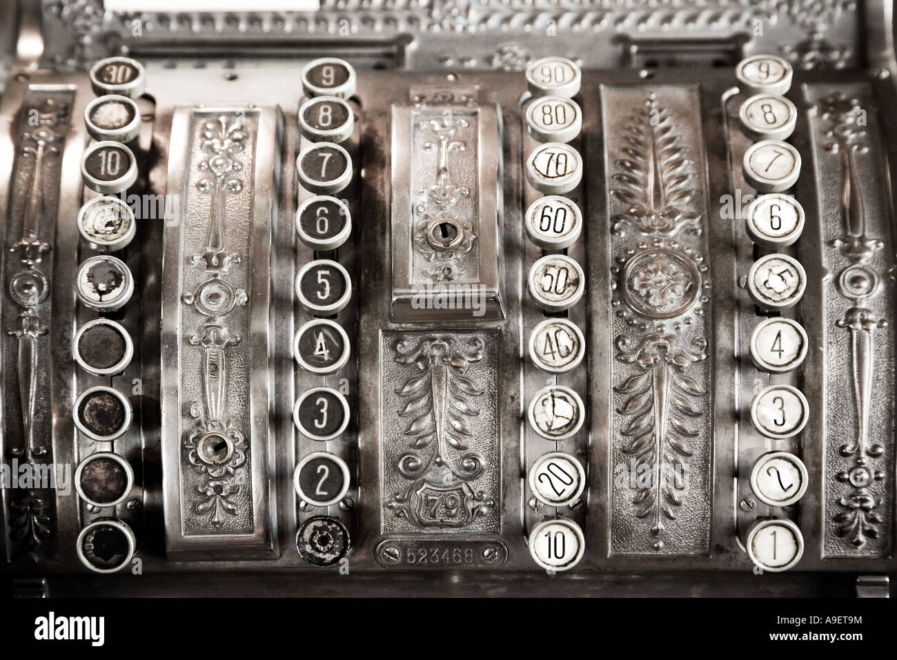 Keyboard on an old cash register Stock Photo