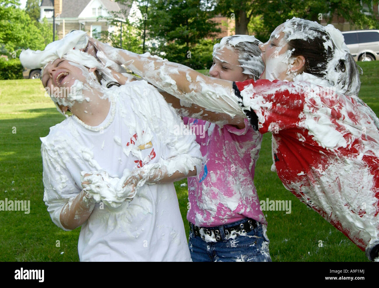 kids having a shaving cream battle Stock Photo Alamy