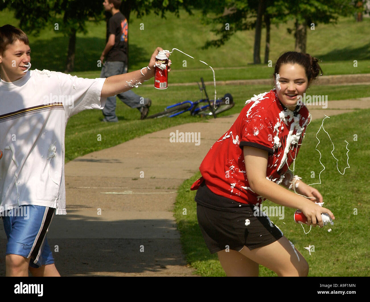 kids having a shaving cream battle Stock Photo Alamy