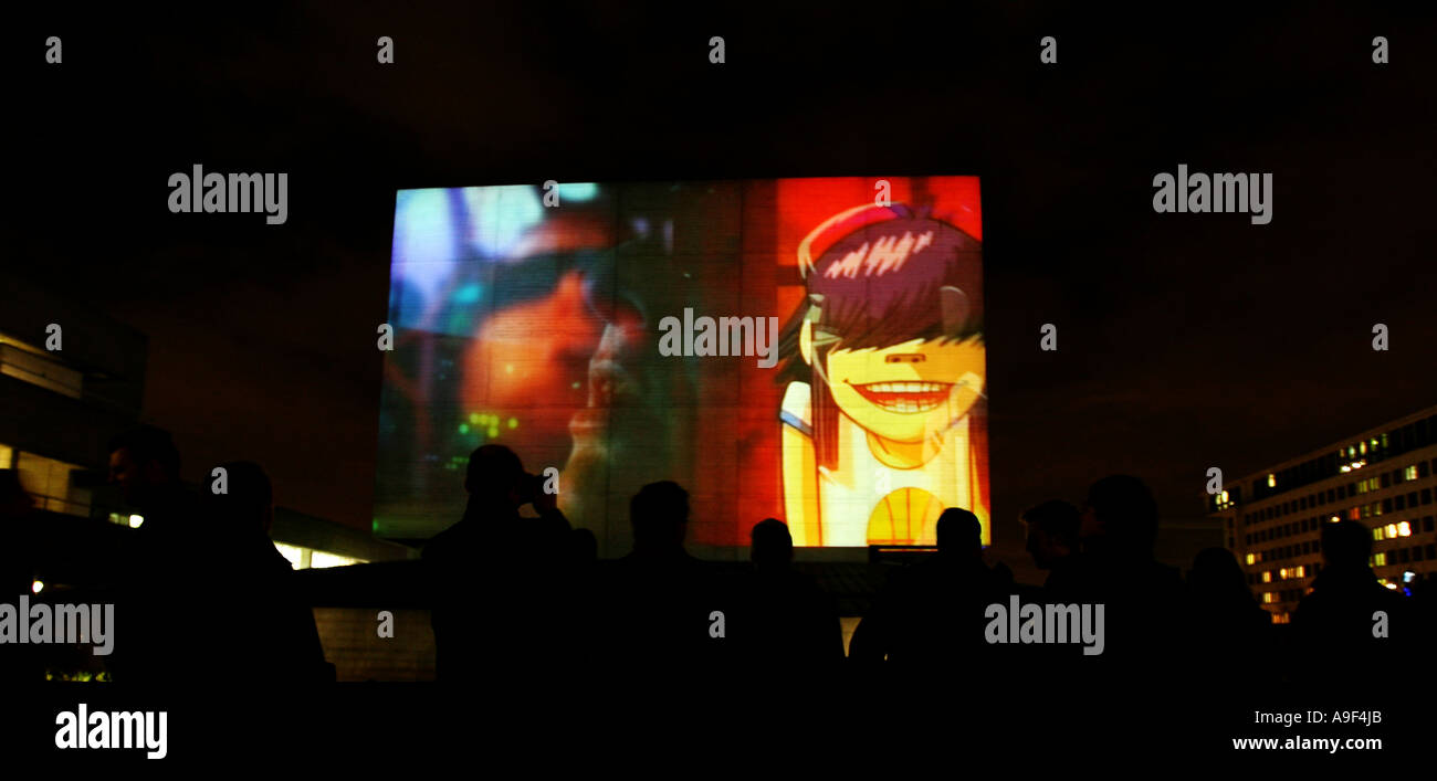 A giant screen plays a music video during the 'Inside Out' Programm at the south bank, London, 24 March 2006 Stock Photo