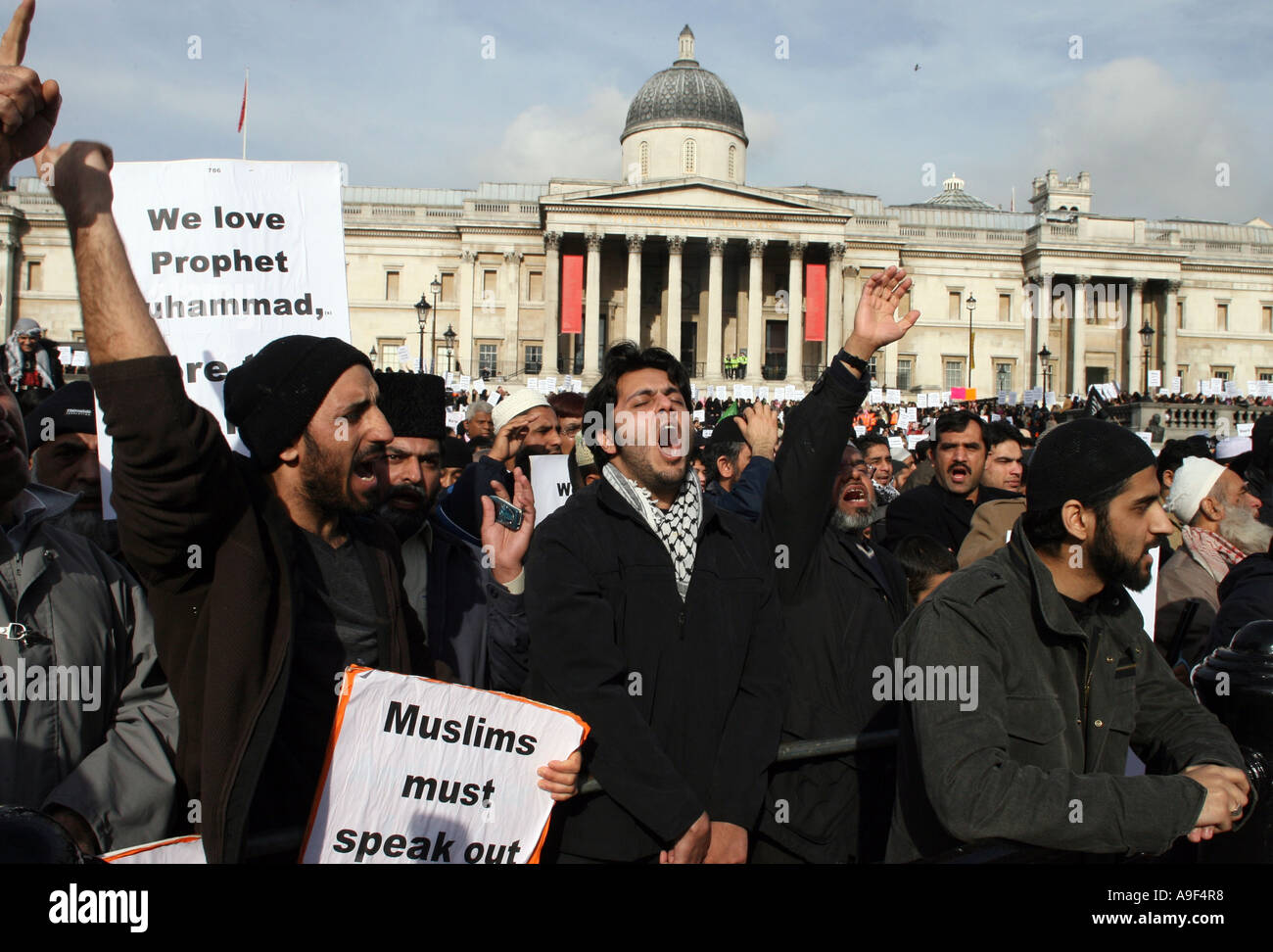 Muslims protesters demonstrate at Trafalgar Square against the publication of cartoons of Prophet Mohammed, 18 February 2006 Stock Photo