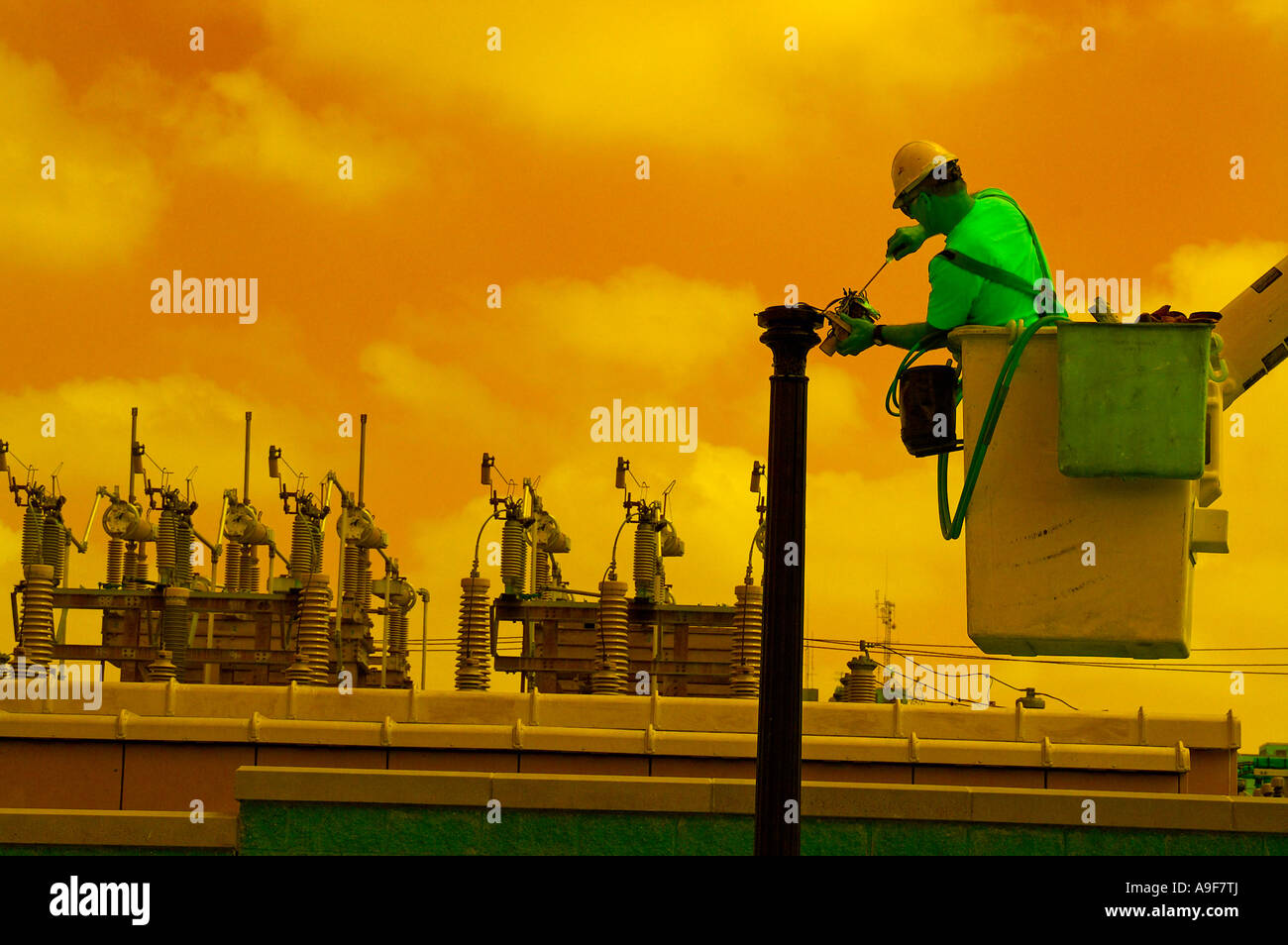 electric utility lineman linemen working in boom truck Stock Photo Alamy