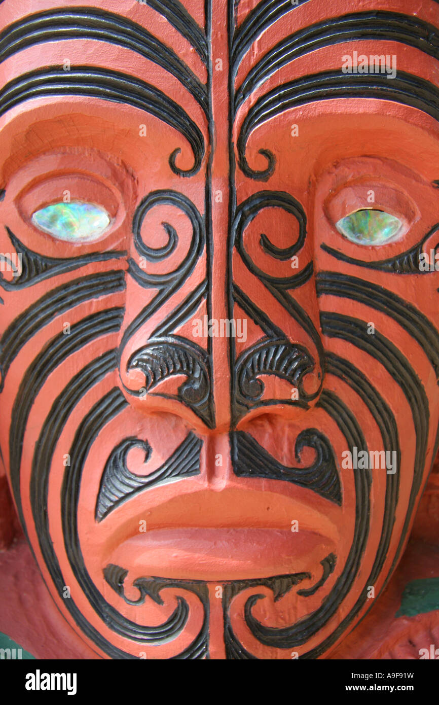 A traditional Maori carving decorating the wall of the Canoe House at