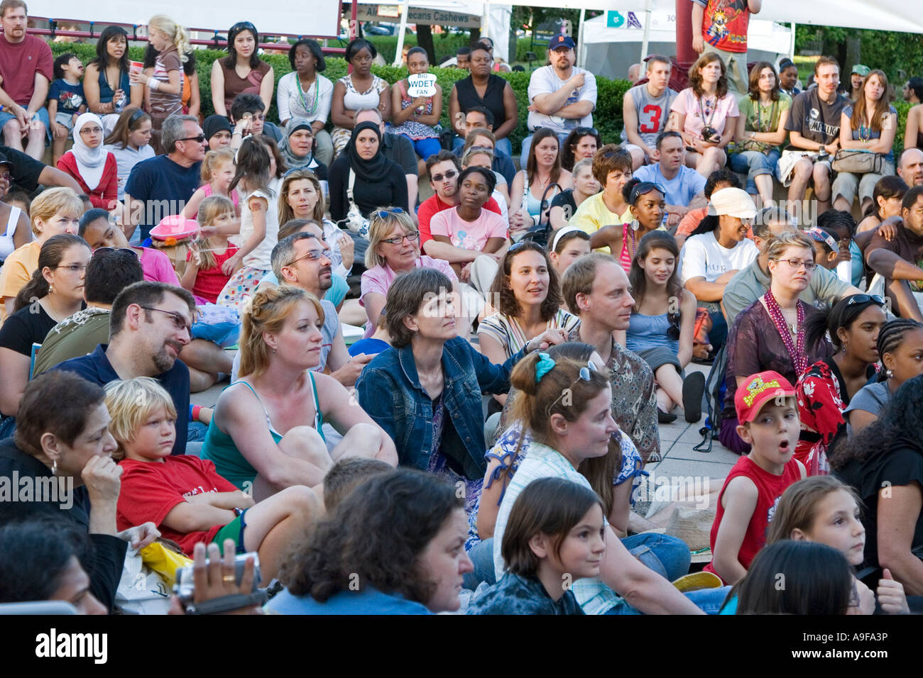 Detroit Michigan A crowd watches a street theater performance at the