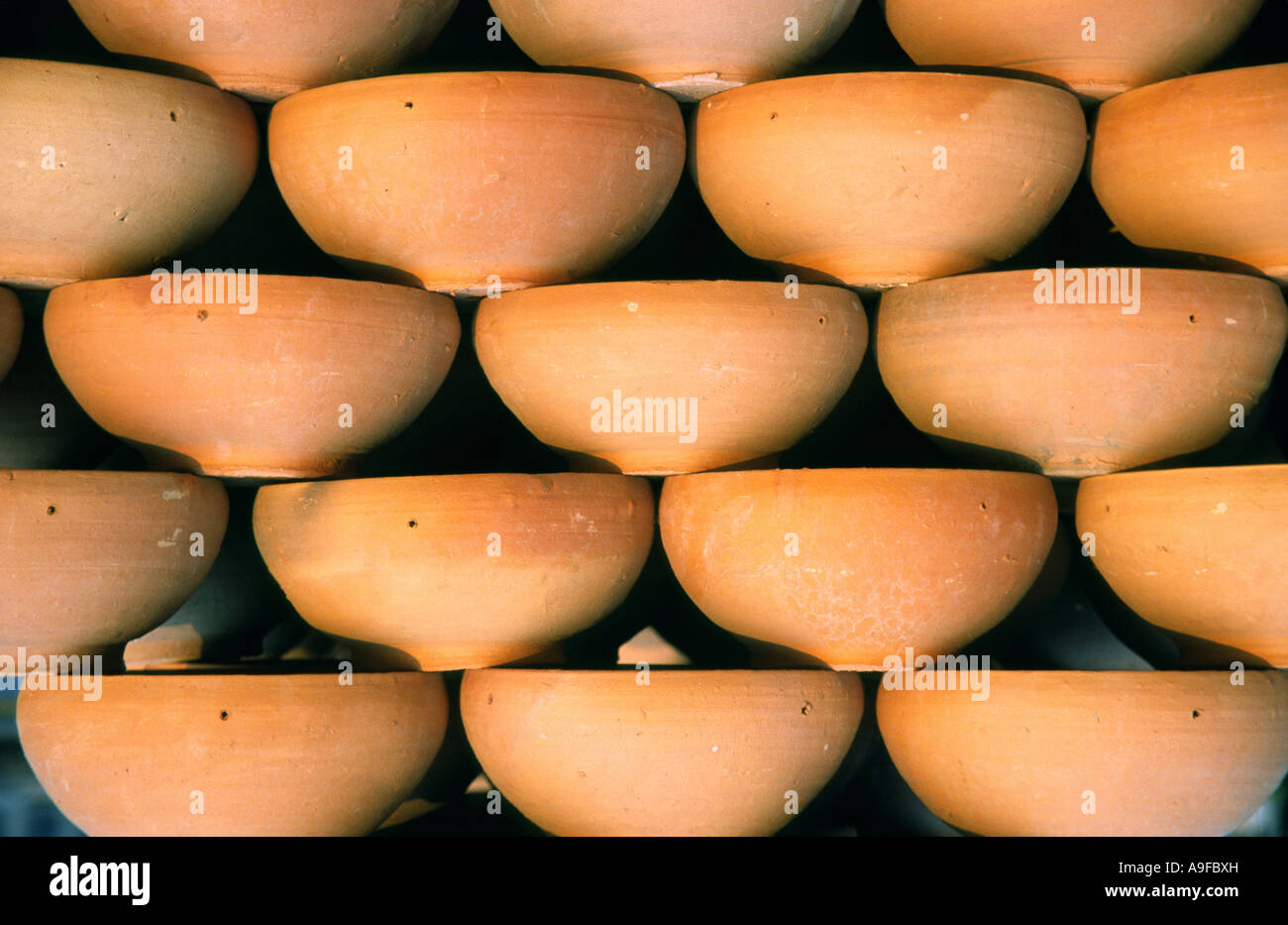 Thai ceramics pottery pots containers stacked hires stock photography