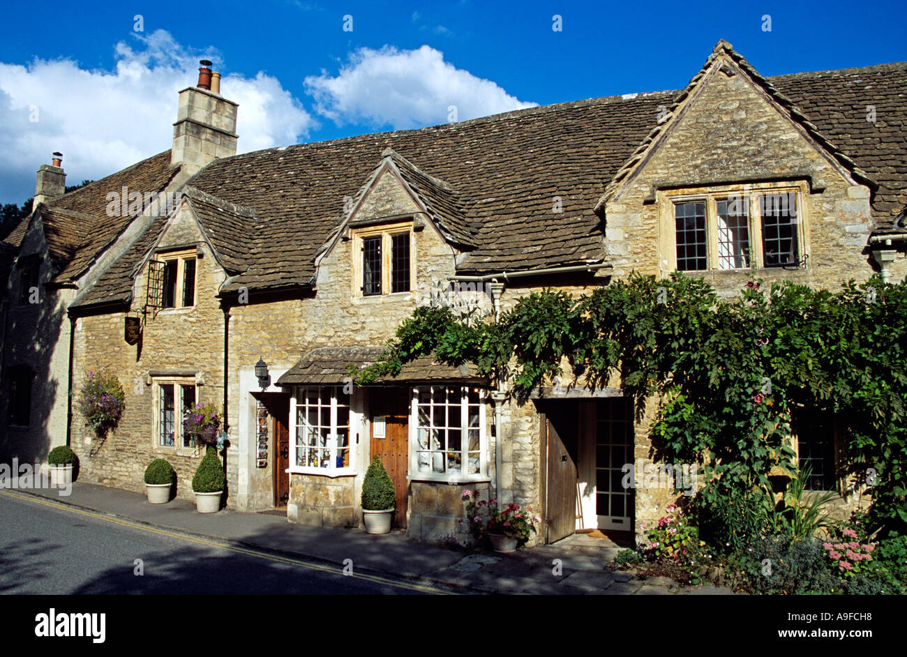 Gallery on the Bridge gift shop, Castle Coombe, Wiltshire, England Stock Photo