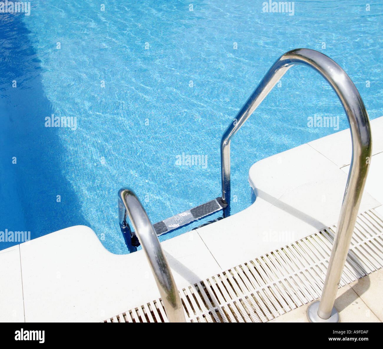 Swimming pool ladder Stock Photo
