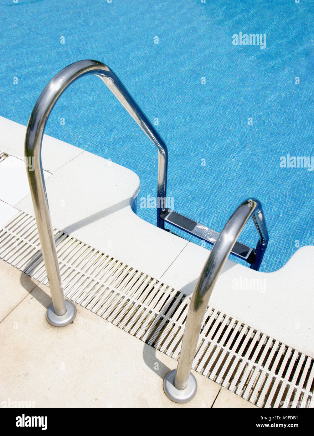 Swimming pool ladder Stock Photo