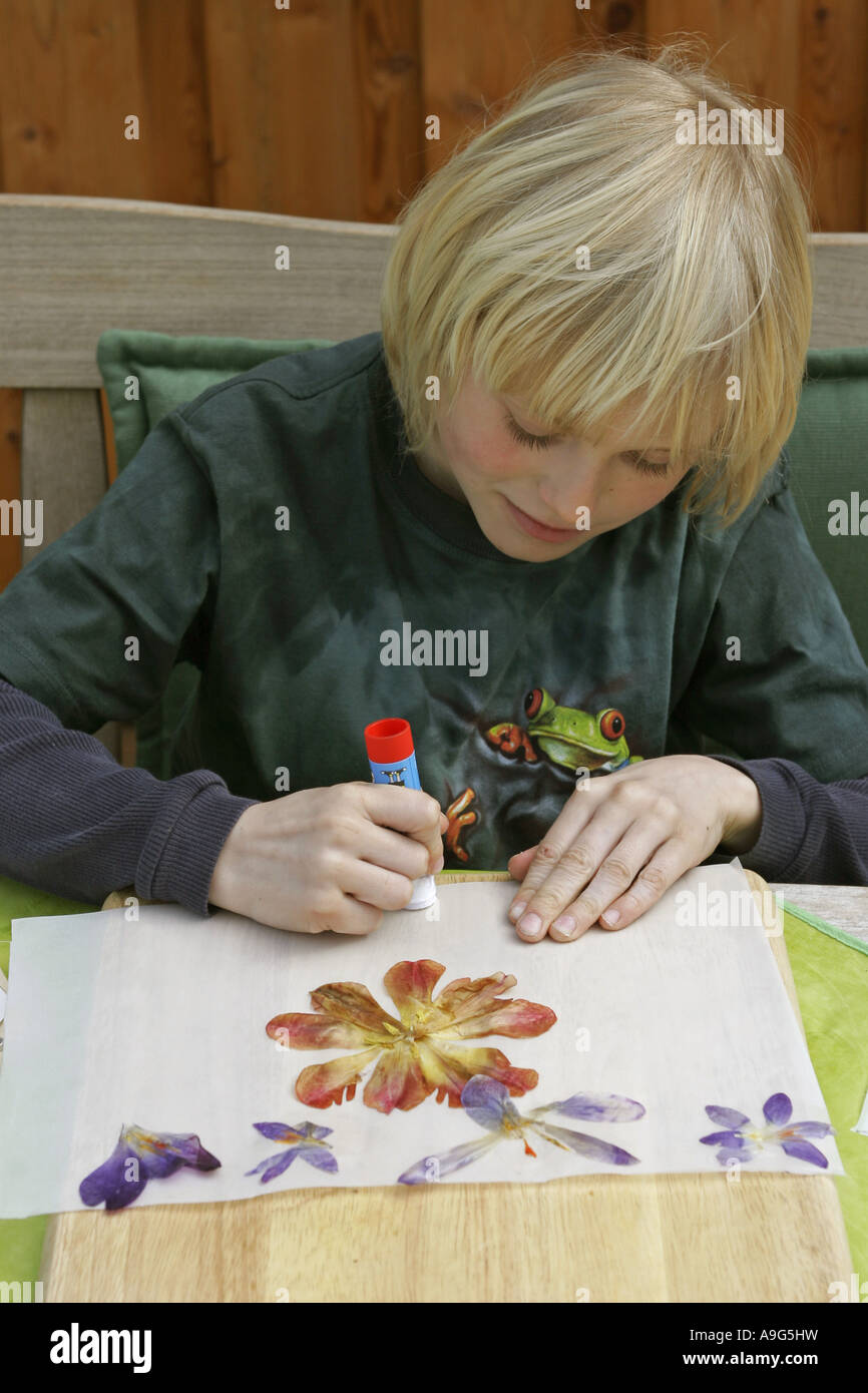 child doing blossom picture handicrafts Stock Photo