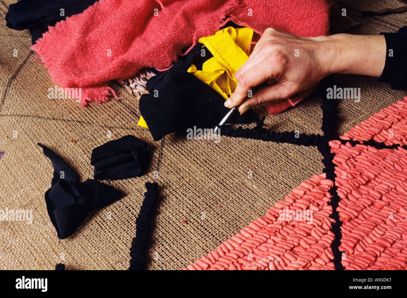 Making a hooked rag rug by Liz Kitchen Stock Photo Alamy