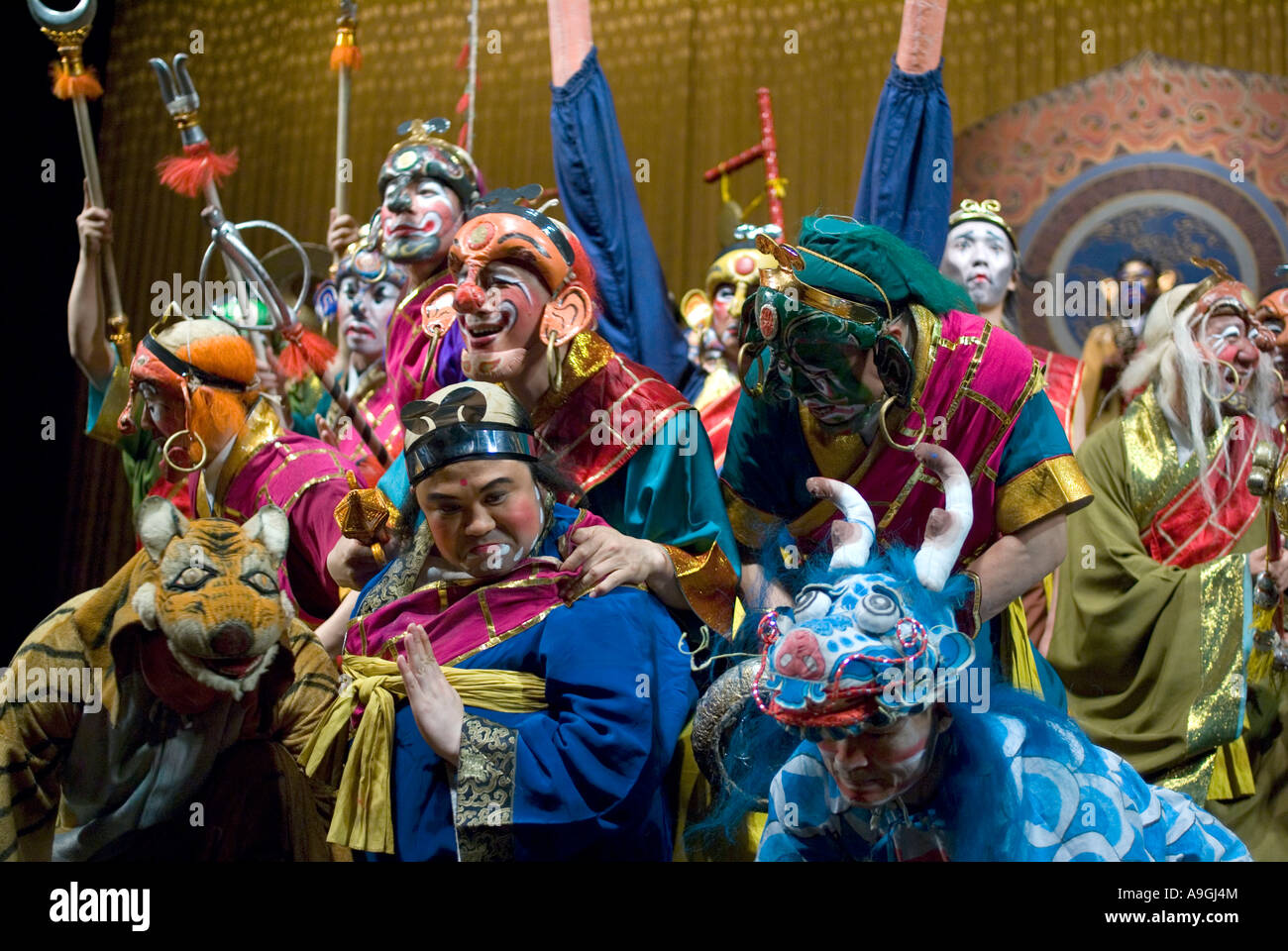Colorful characters from the Beijing Opera Journey to the West on stage at the Liyuan Theater Stock Photo