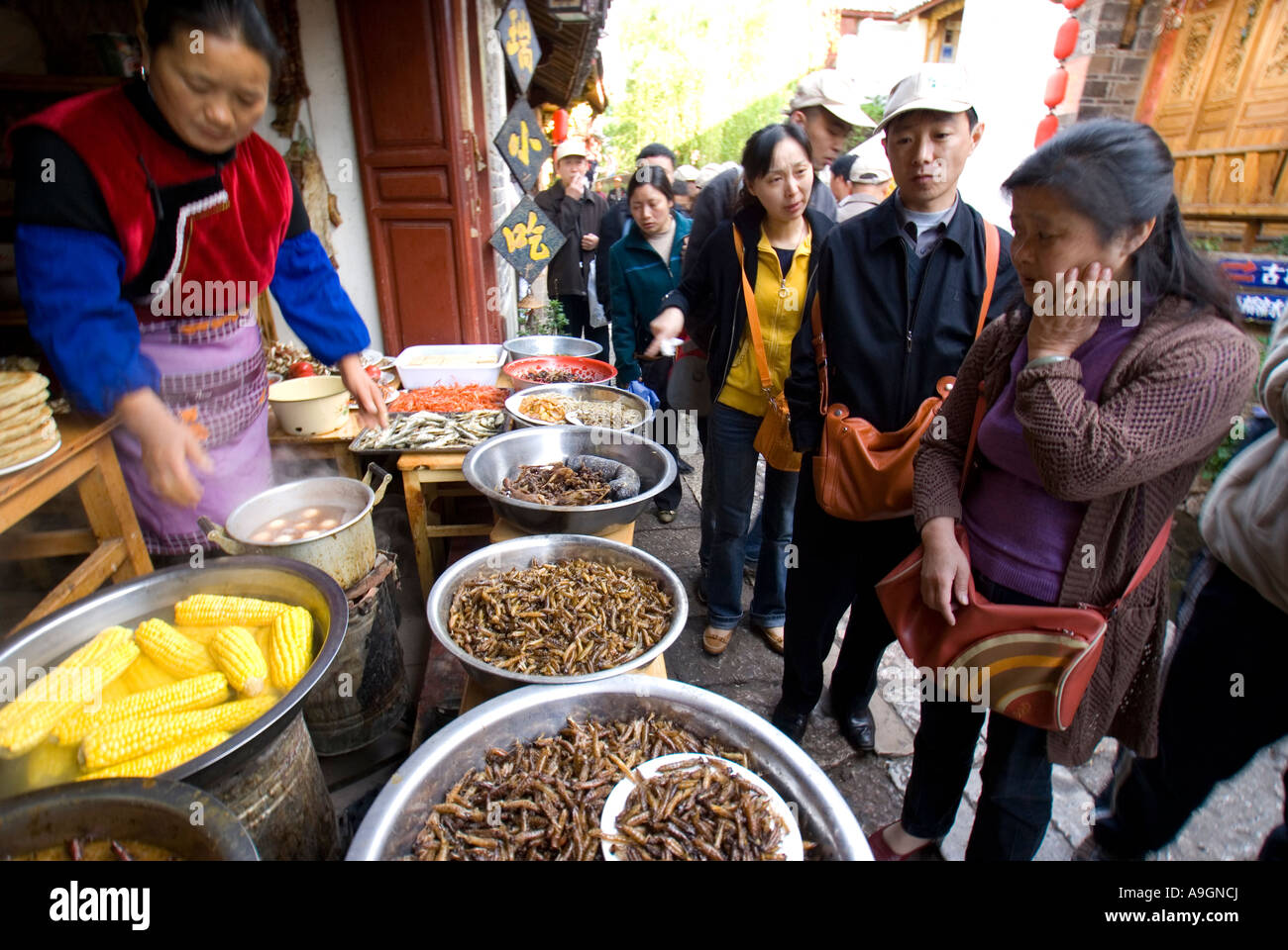 Lijiang Old Town food stall, Yunnan, China Stock Photo - Alamy