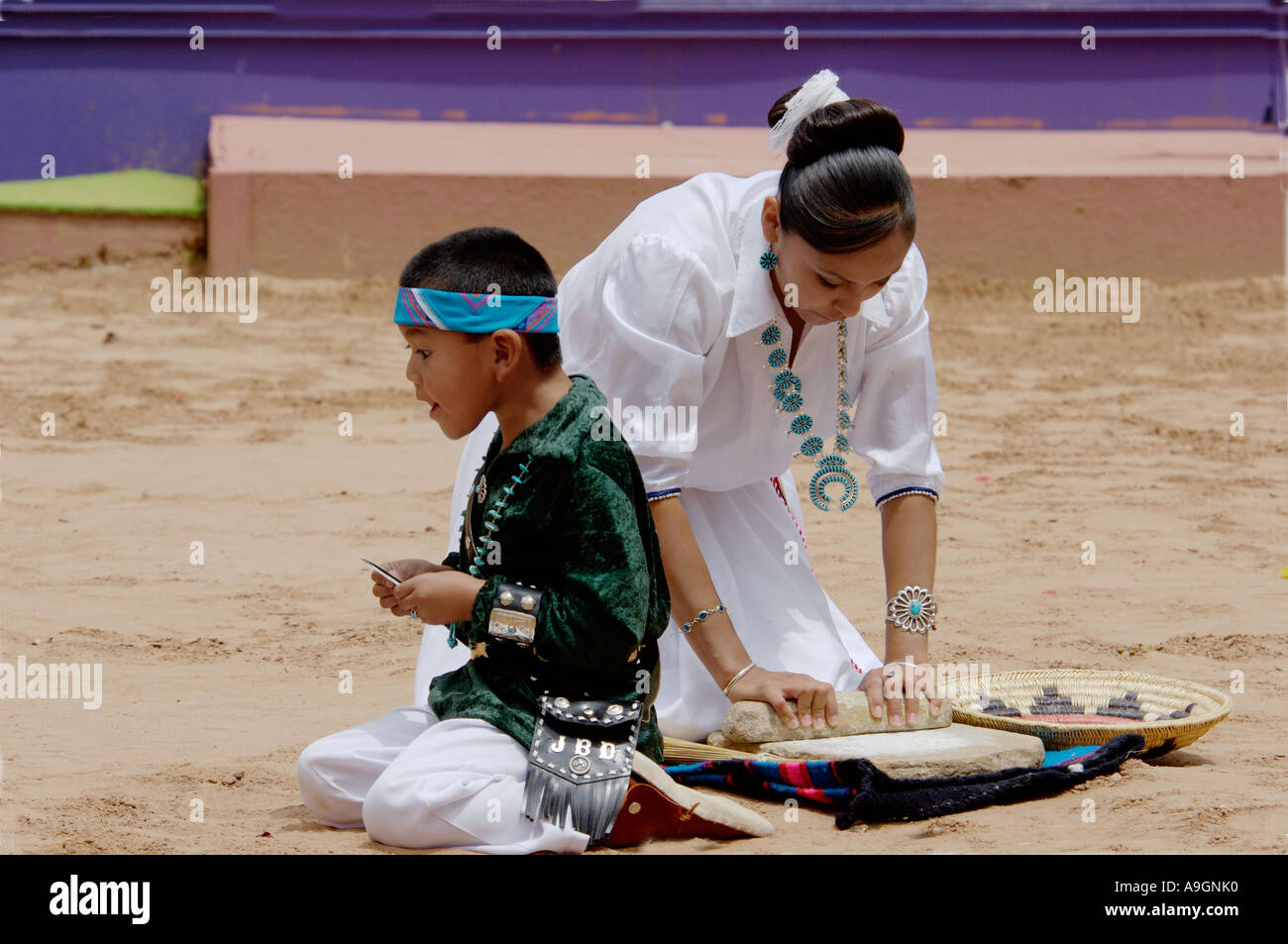 Navajo Blue Eagle Dancer performing Corn Grinding Dance at the Intertribal Ceremonial in Gallup New Mexico. Digital photograph Stock Photo