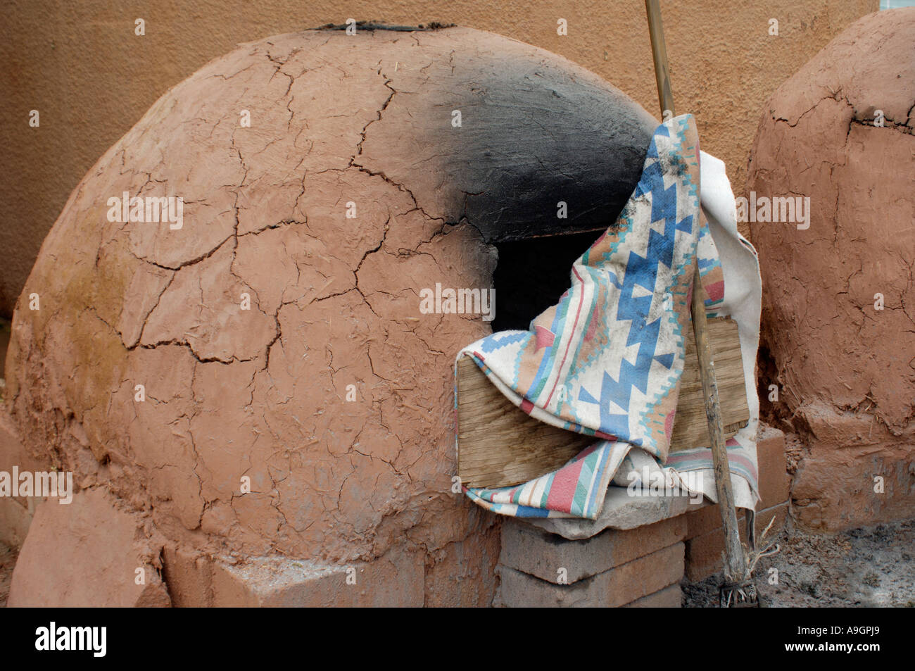 Bread baking in a Zuni Pueblo horno at the Intertribal Ceremonial in Gallup New Mexico. Digital photograph Stock Photo