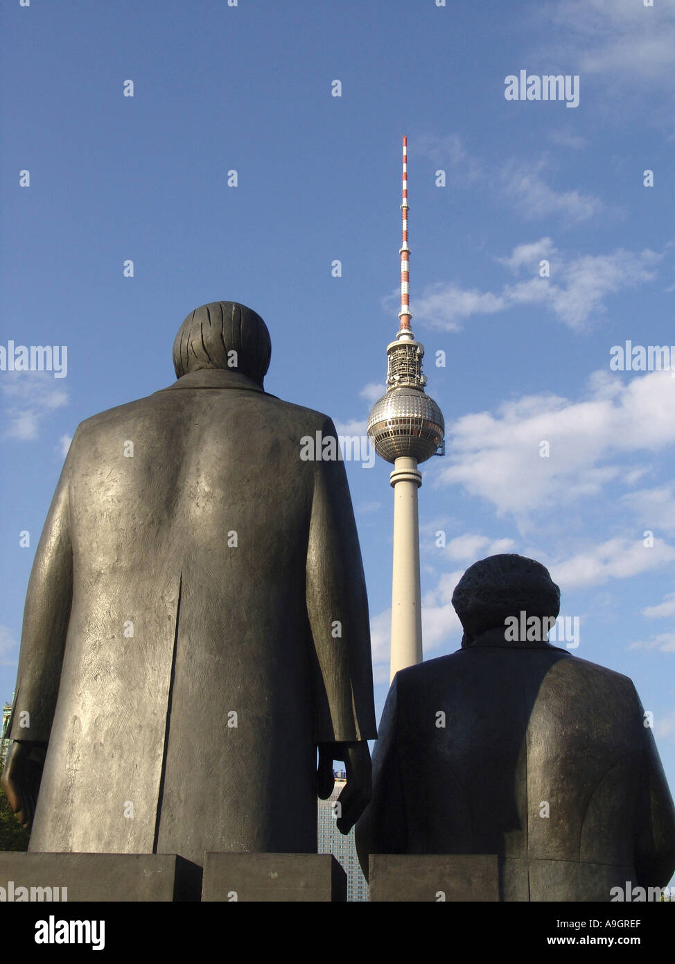 MarxEngels monument with Berlin television tower, designed by Ludwig Engelhardt, Germany