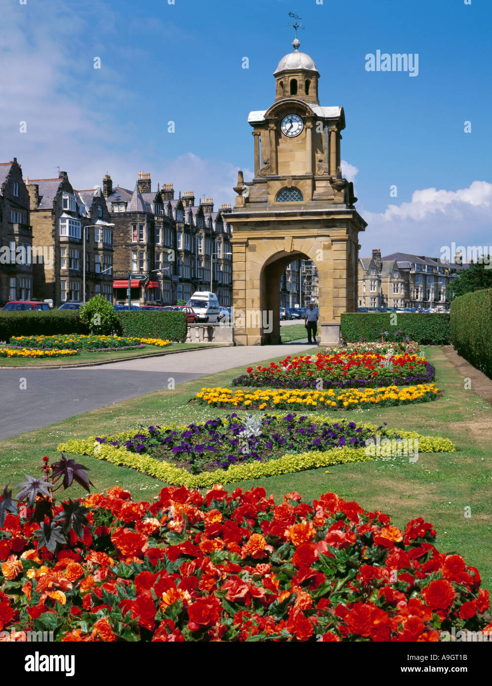 Holbeck Clock Tower and flower beds, South Cliff, Scarborough, North Yorkshire, England, UK. Stock Photo