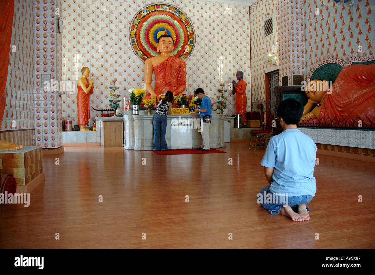 Asian woman kneeling in hi-res stock photography and images - Alamy