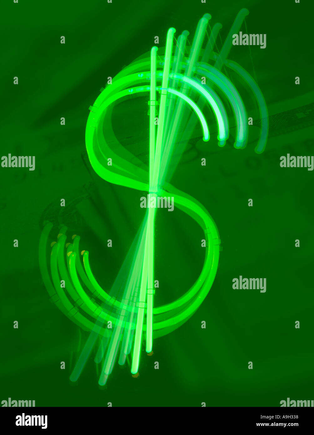 Neon dollar symbol with green cash background Stock Photo
