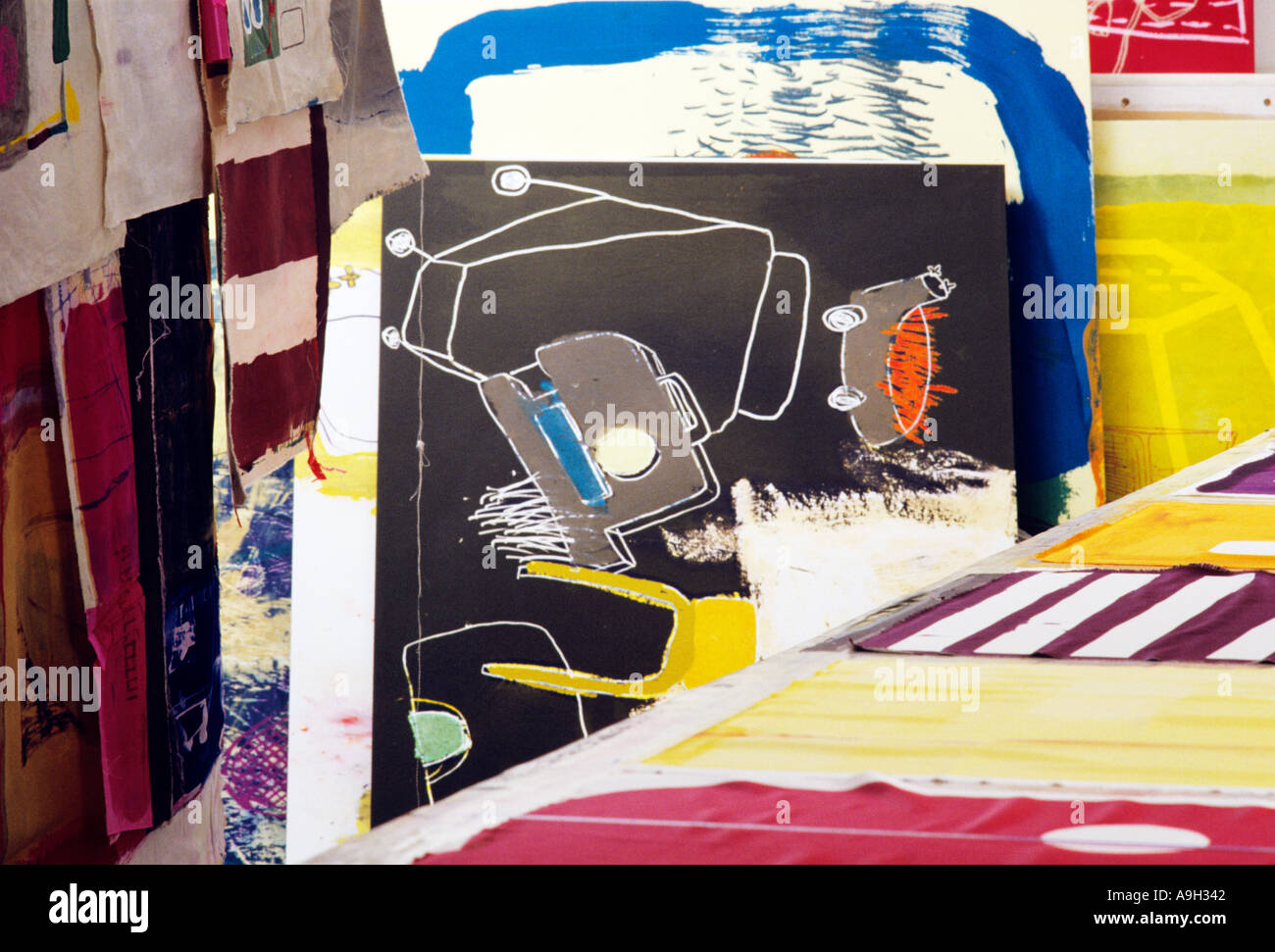 A corner of a silk screen printers studio Stock Photo Alamy