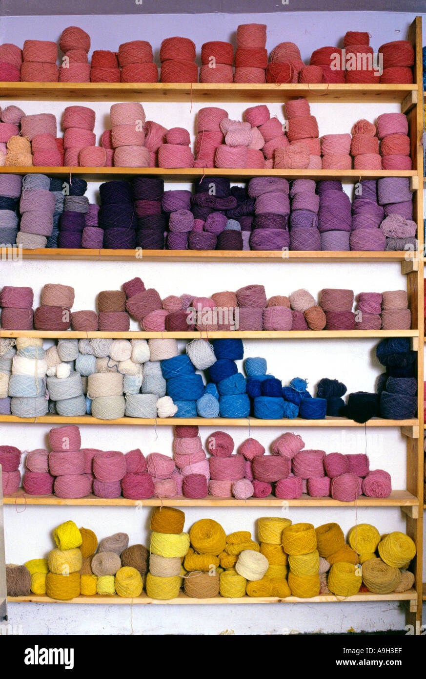 Shelves of hand dyed balls of wool The Natural Dye Company  Stock Photo