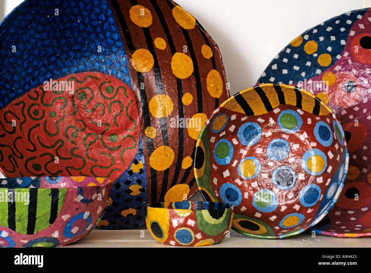 Colourful papier mache bowls made by Gerry Copp Stock Photo - Alamy