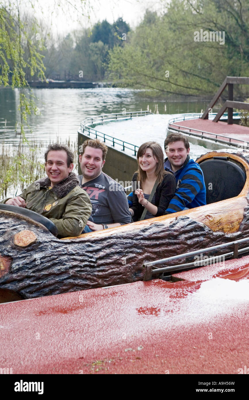 Group of young adults riding the Loggers Leap log flume ride at Thorpe ...