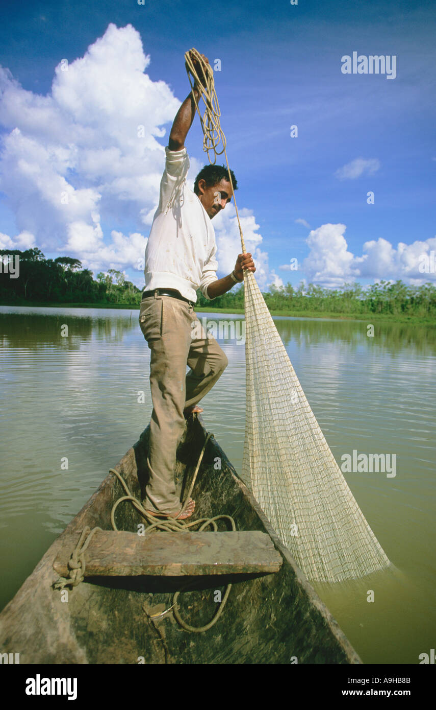 local man cast net fishing on the remote Purus River in the