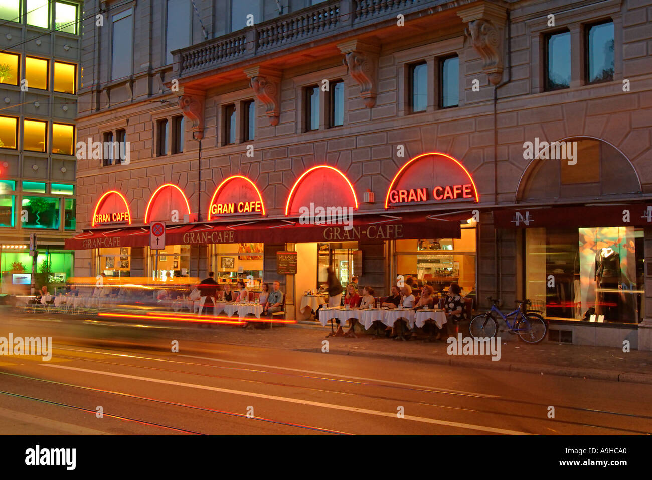 Switzerland Zurich Gran Cafe outdoor terasse in summer at dawn Limmatquai Stock Photo