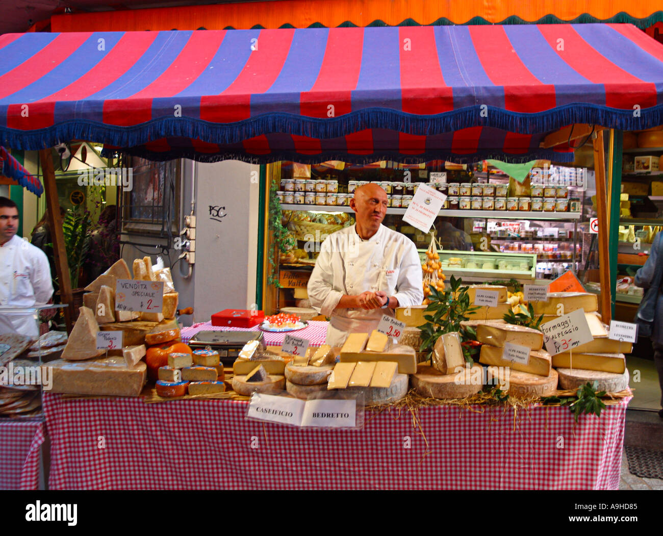 Switzerland Tessin Lugano old city center Via Pessina delicatessen outdoor cheese stall dealer  Stock Photo