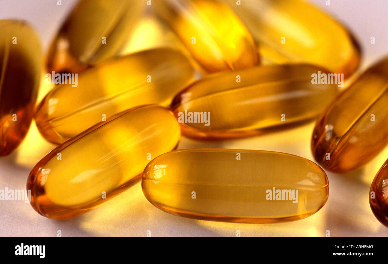 cod liver oil capsules in close up Stock Photo