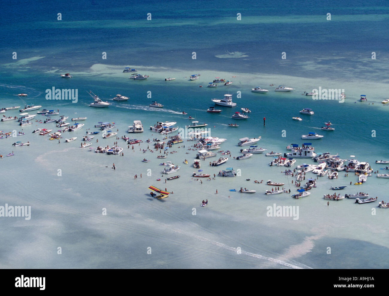 FL Upper Keys Aerial Boaters gather on sandbar Stock Photo