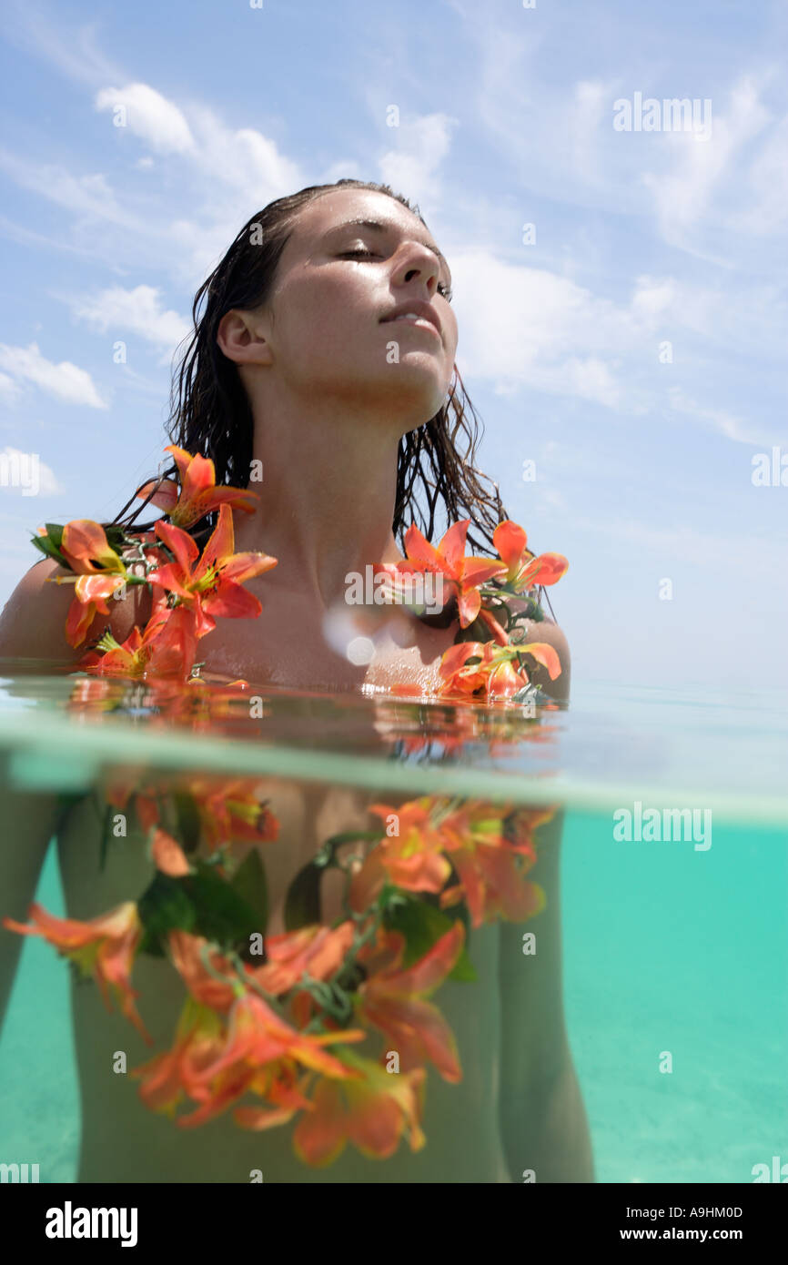 Young woman with lei under over Playa Palencar west side Cozumel Mexico Stock Photo