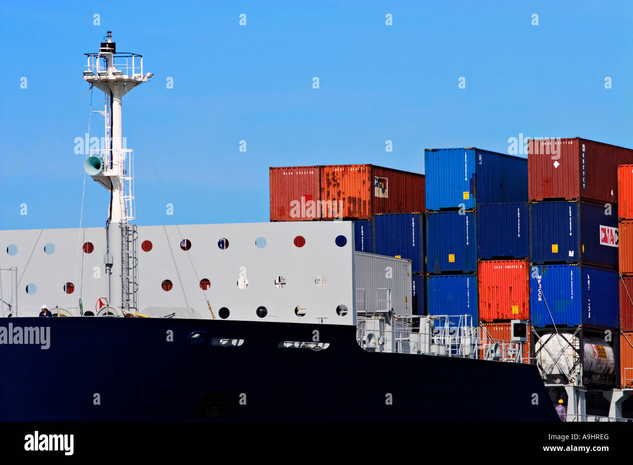 Shipping Industry / Shipping Containers stacked on the deck of a ...