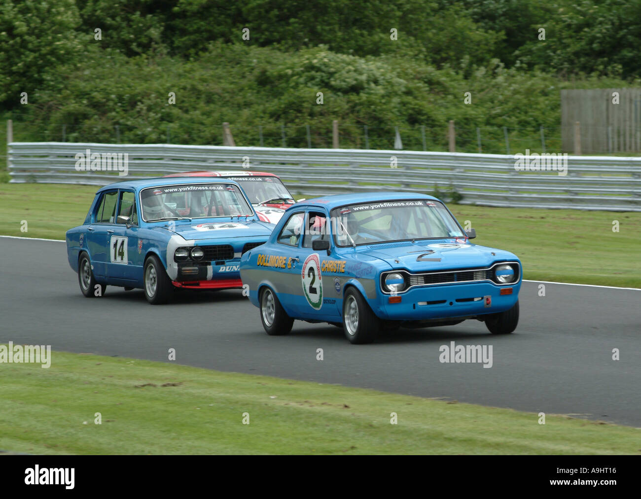 Ford Escort RS2000 and Triumph Dolomite Sprint Racing at Oulton Park Motor Racing Circuit Cheshire England United Kingdom UK Stock Photo