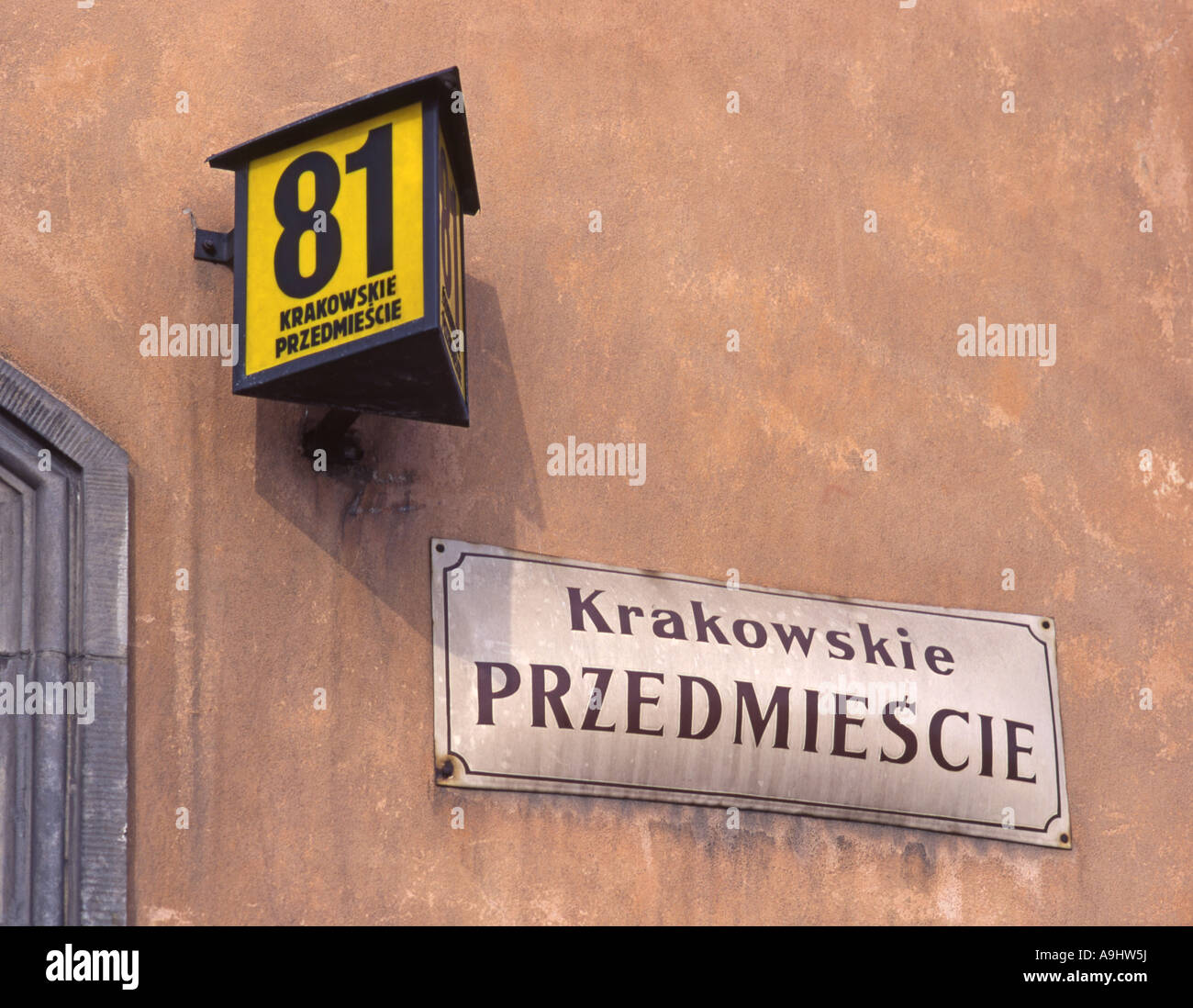 Warsaw, Poland. Old Street Sign and House Number - Krakowskie Przedmiescie 81 Stock Photo