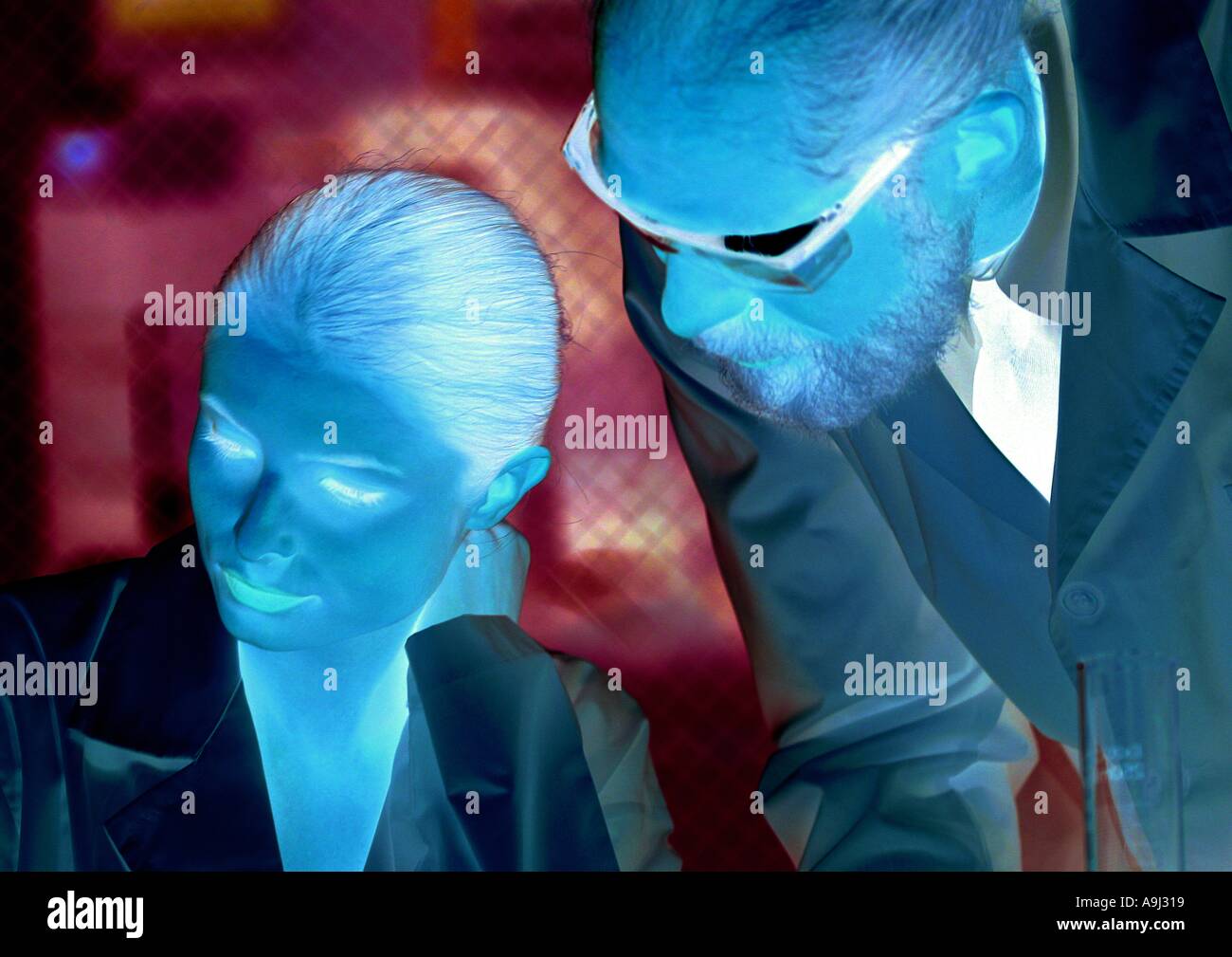 Two young scientists sitting hi-res stock photography and images - Alamy