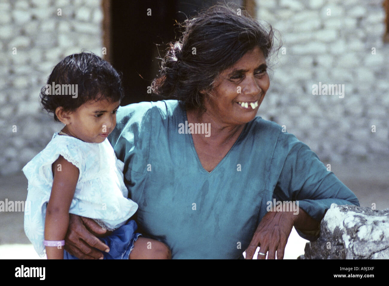 woman and child, Maldives Stock Photo