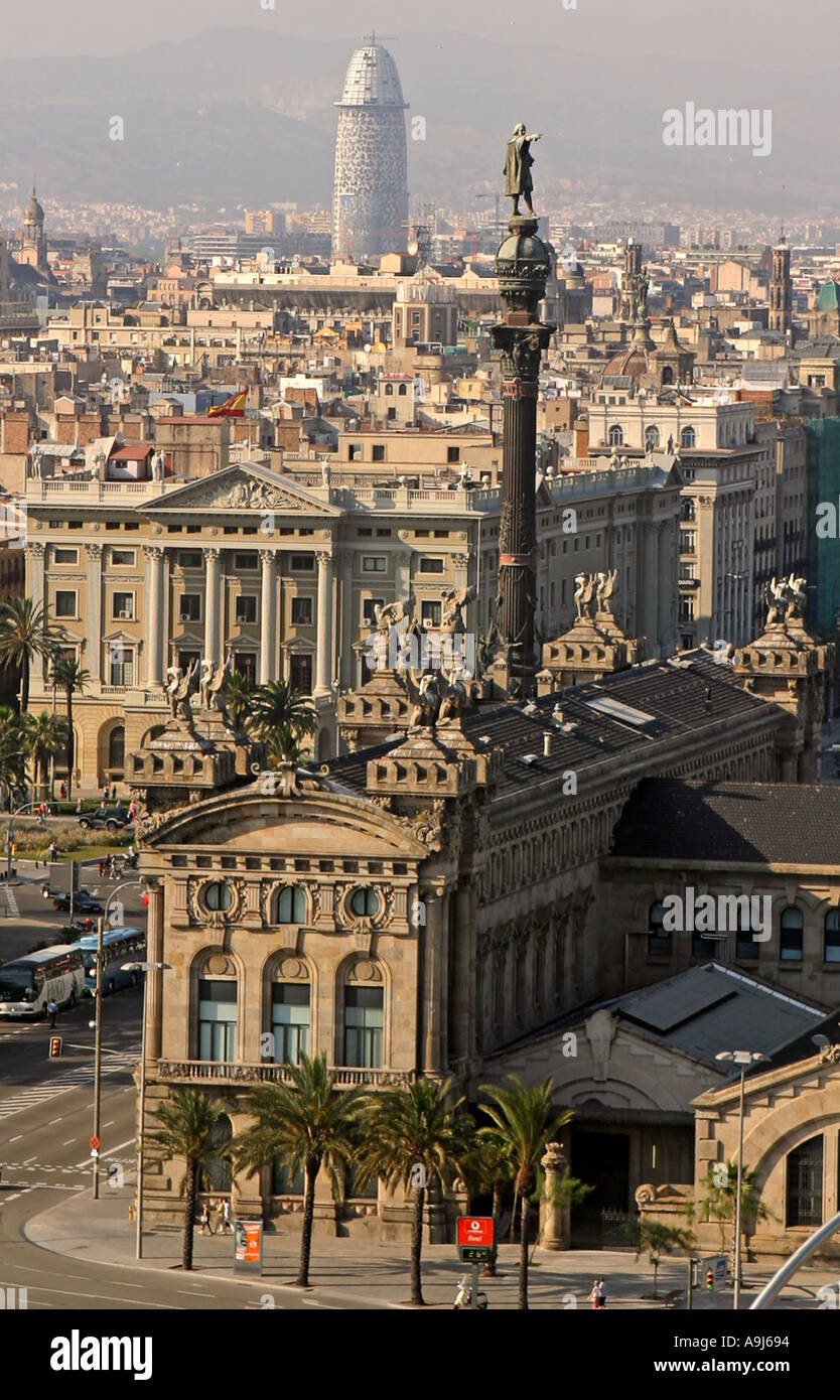 Barcelona Columbus Monument Passeig Maritime Tower Agra by Jean Nouvel in the background  Stock Photo