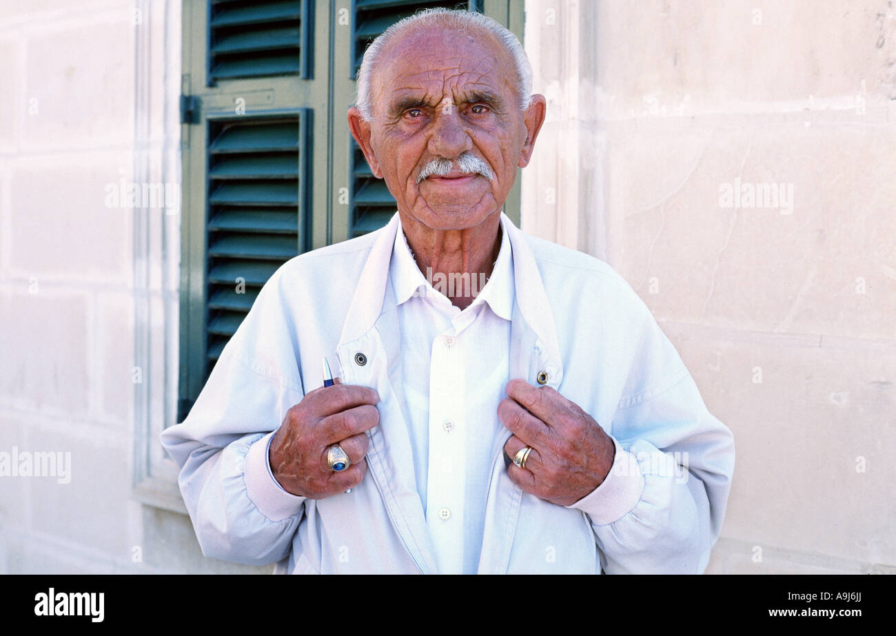 April 7, 2004 - 75 yr old Frankie Said, a parking attendant from Zabbar, has never left the island of Malta in all his life. Stock Photo